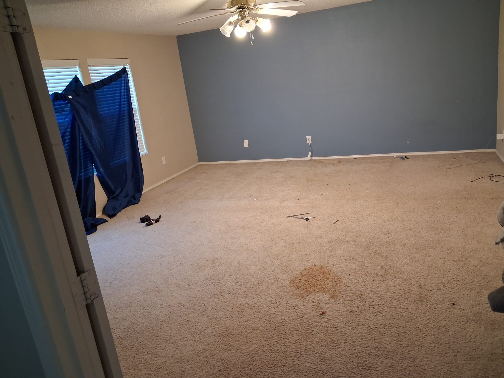 The same bedroom cleared after furniture removal