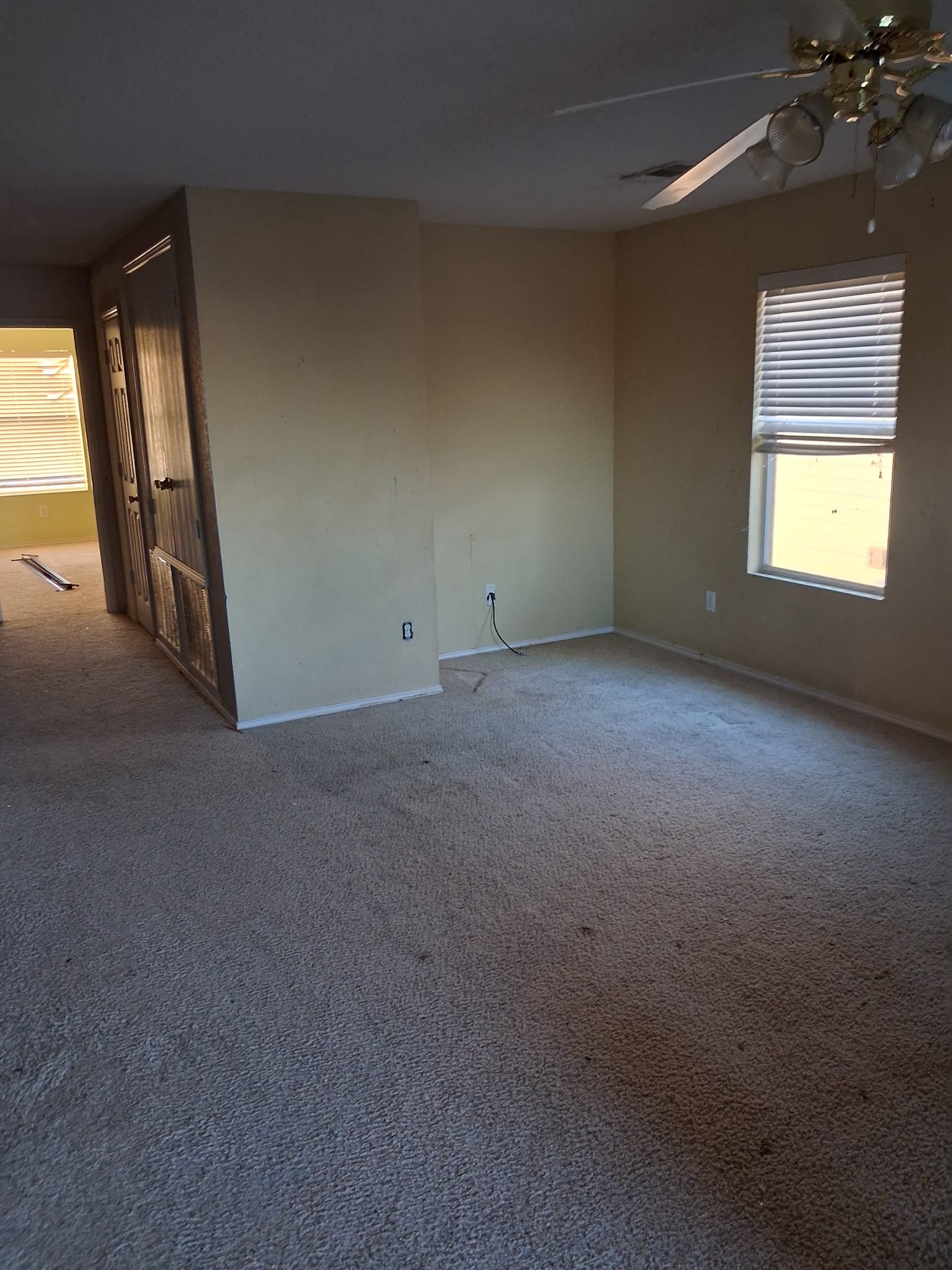 Cleared carpeted room after removal